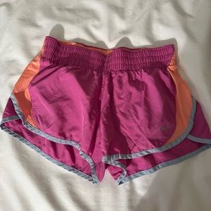 Nike dri-fit running shorts, size Small, pink and orange